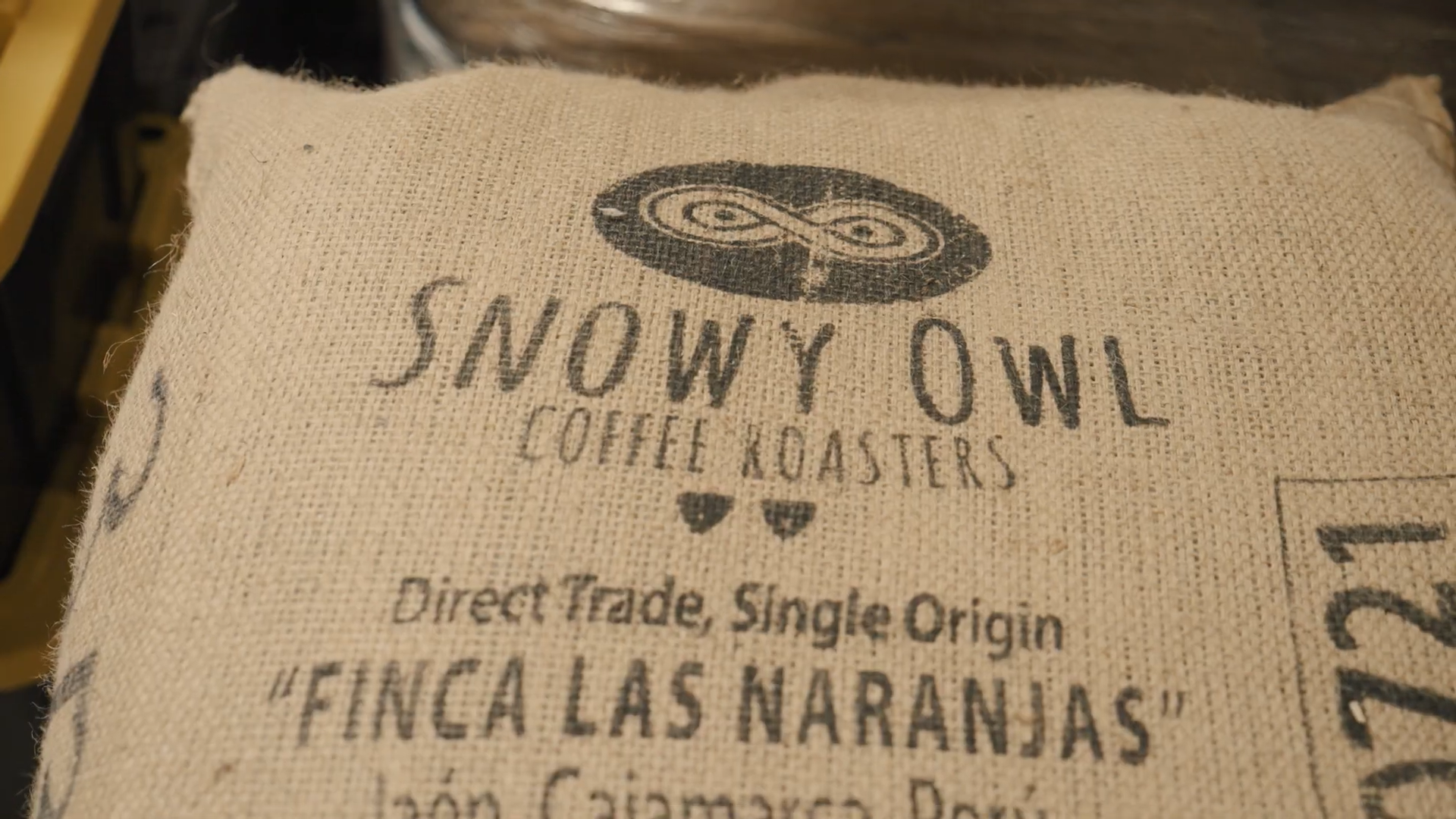 Load video: Direct trade single-origin coffee beans from Finca Las Naranjas arrive at our roastery in burlap sacks, ready to be expertly roasted for the perfect specialty coffee experience.